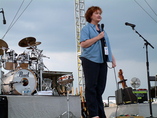 Cathy Gurley, National Liaison of the tour, introduces one of the tour's many shows